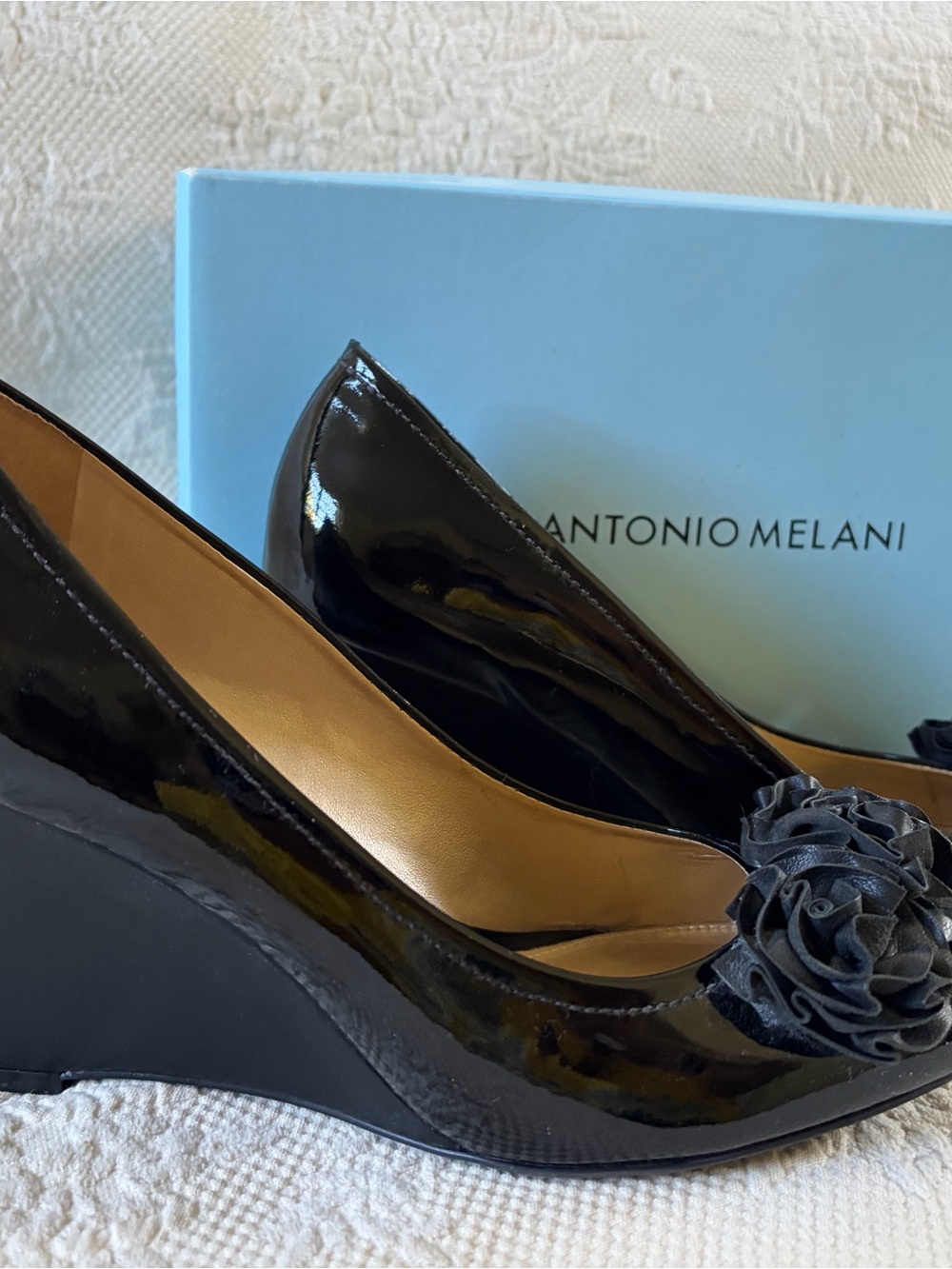 ANTONIO MELANI Black Patent Wedge Pumps with Floral Accent